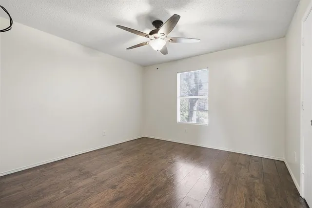 a bathroom with a sink a toilet and vanity