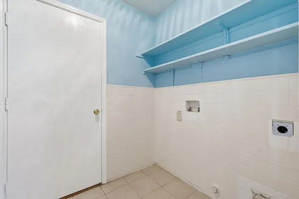 a view of a garage with wooden floor