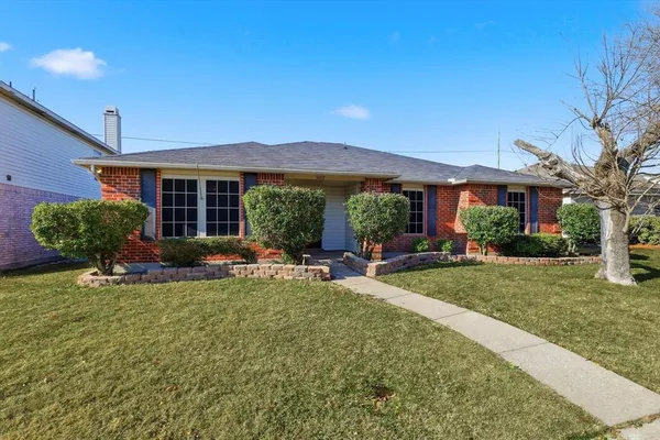a view of a house with backyard sitting area and porch