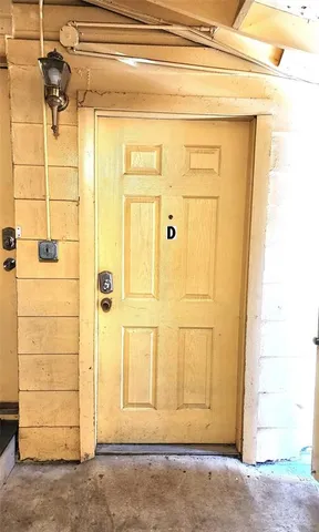 a kitchen with stainless steel appliances a refrigerator sink and cabinets