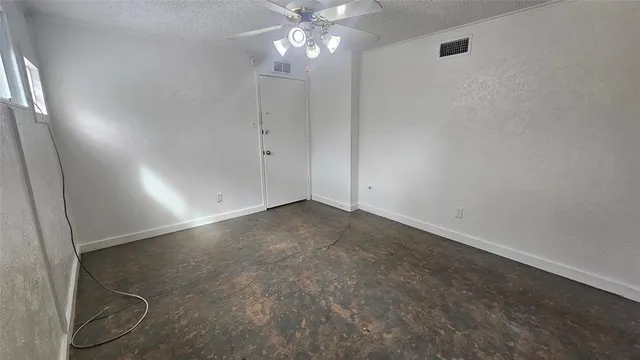 a view of hallway with white wooden floor