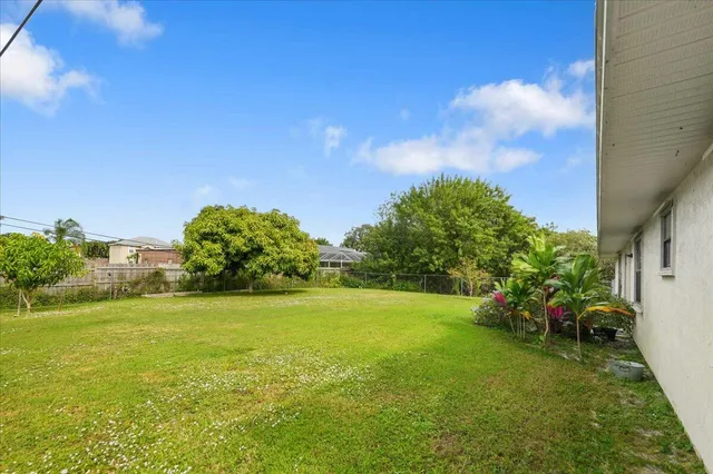 a house view with a garden space