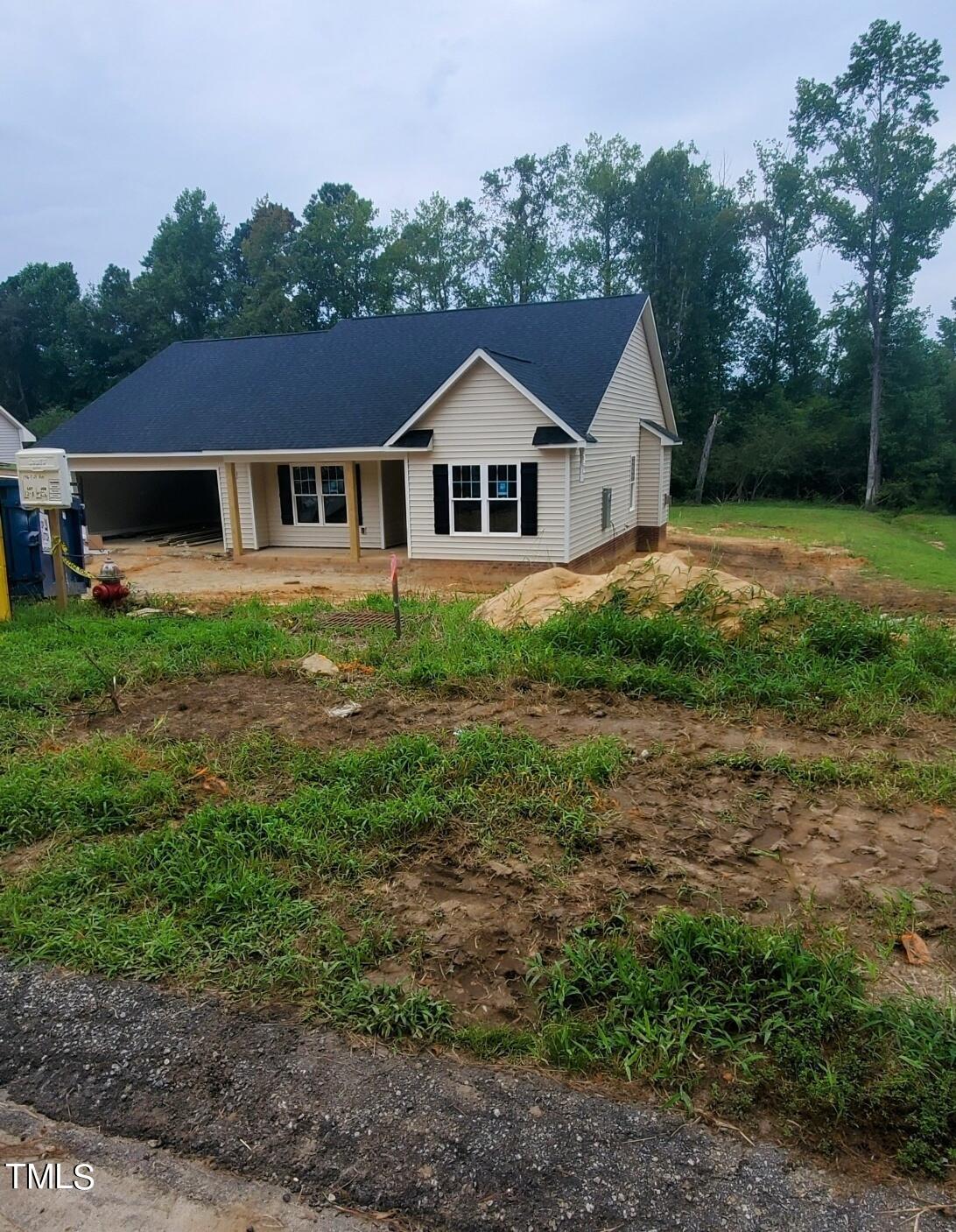 a house view with a garden space