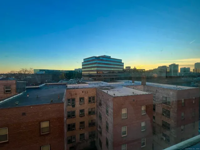 wooden floor in a hall with an entryway