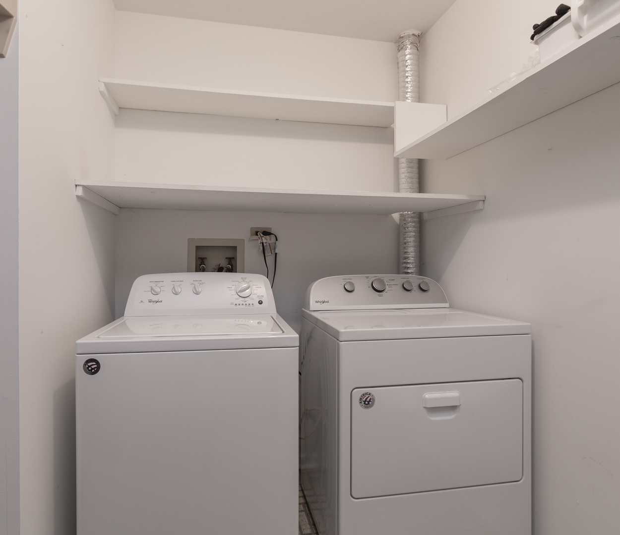 735 Weidner Road, Unit 145A1 Buffalo Grove, IL 60089 - Photo 20 of 25 a utility room with dryer and washer