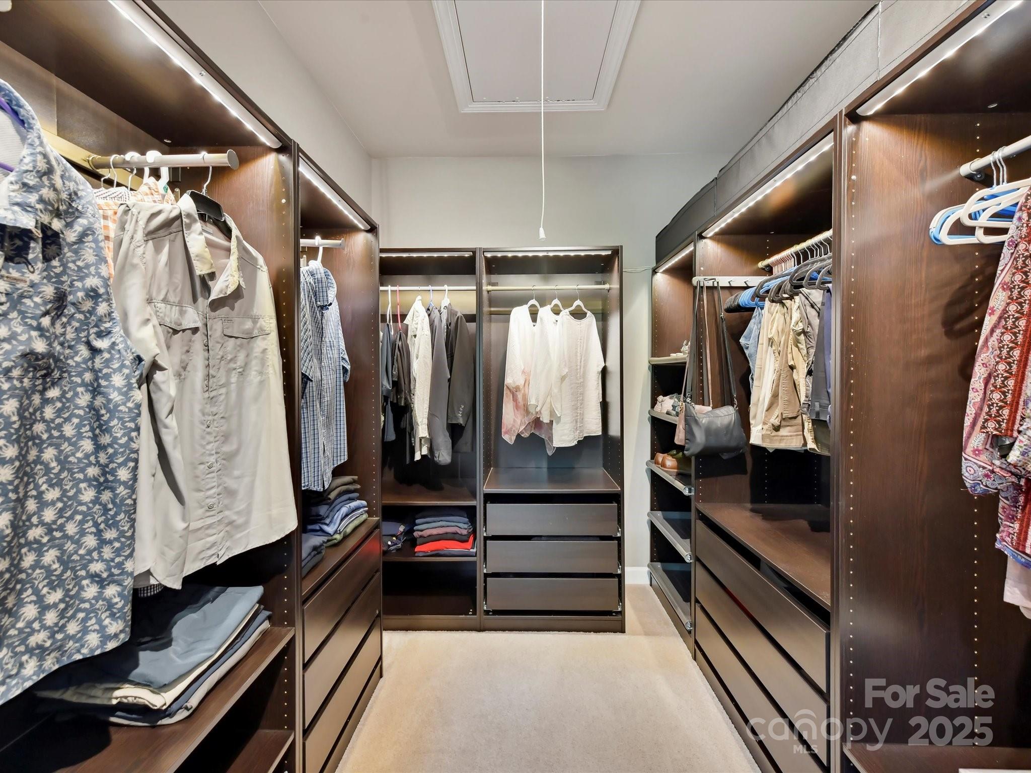 2972 Arches Bluff Circle Lancaster, SC 29720 - Photo 21 of 47 a view of walk in closet with clothes and shoes