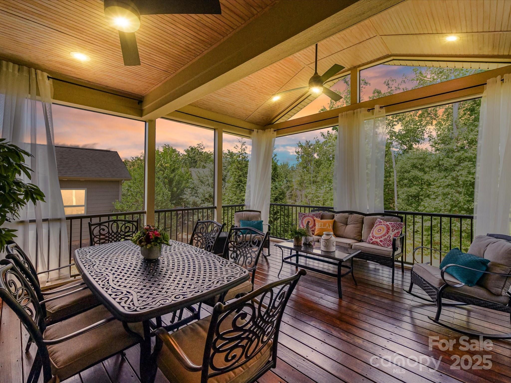 2972 Arches Bluff Circle Lancaster, SC 29720 - Photo 29 of 47 a view of a patio with a dining table and chairs