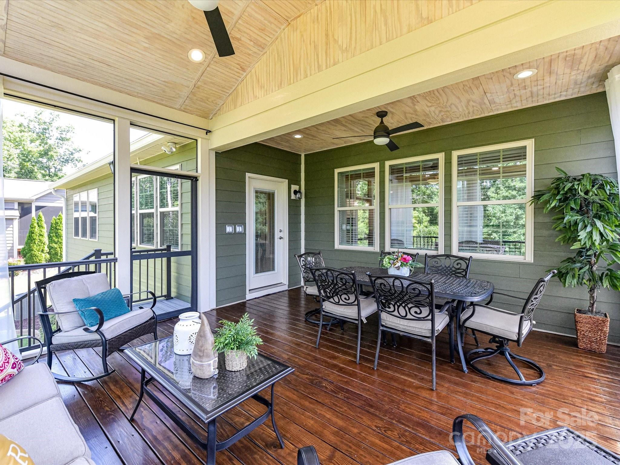 2972 Arches Bluff Circle Lancaster, SC 29720 - Photo 30 of 47 a outdoor living space with furniture and a potted plant