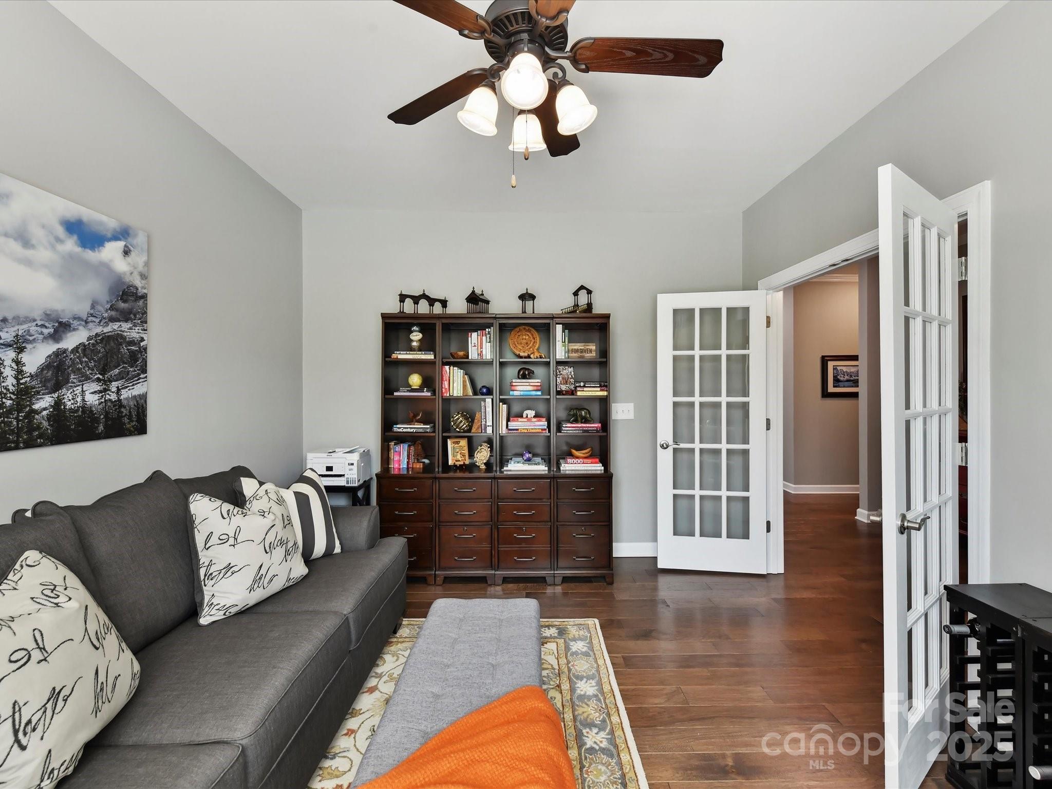 2972 Arches Bluff Circle Lancaster, SC 29720 - Photo 7 of 47 a living room with furniture and wooden floor