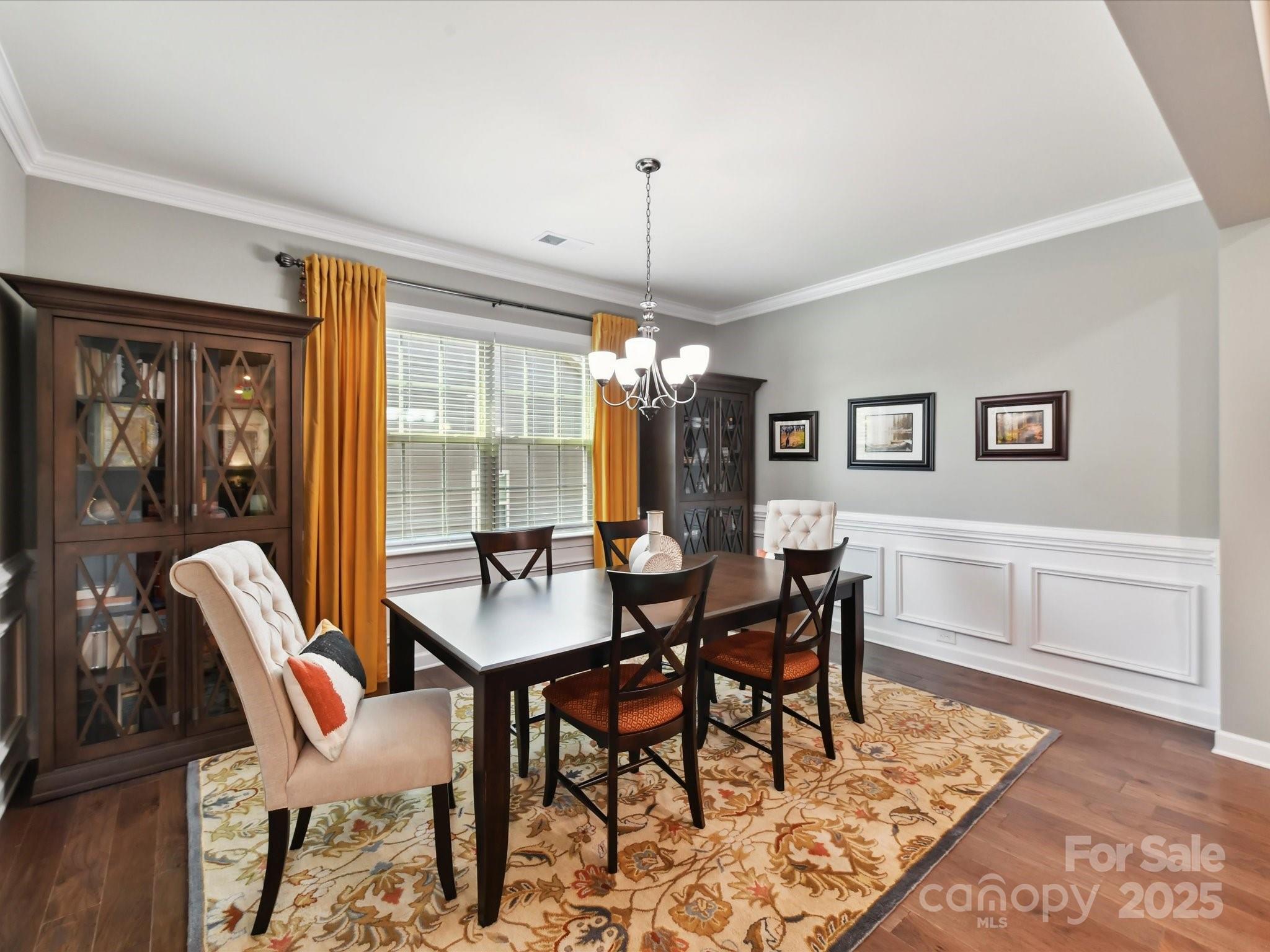 2972 Arches Bluff Circle Lancaster, SC 29720 - Photo 9 of 47 a dining room with furniture a chandelier and wooden floor