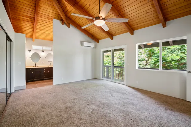 a view of a room with a large window