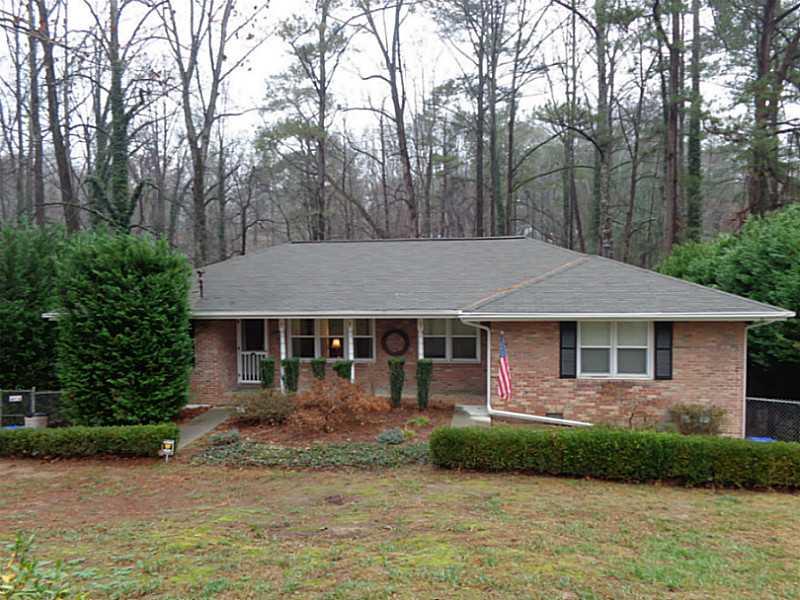 1354 Willivee Drive Decatur, GA 30033 - Photo 1 of 1 a front view of a house with a garden