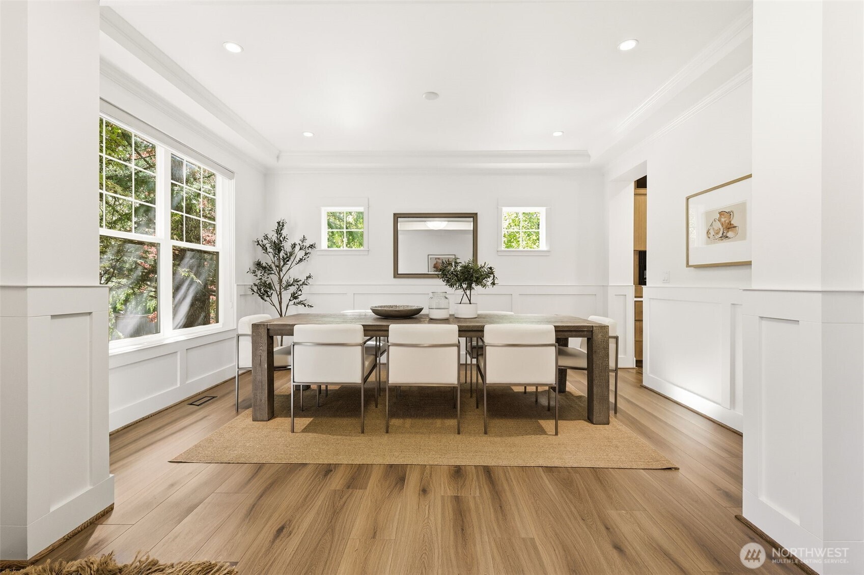1737 Mt Baker Avenue Northeast Renton, WA 98059 - Photo 15 of 40 a view of a dining room with furniture and wooden floor