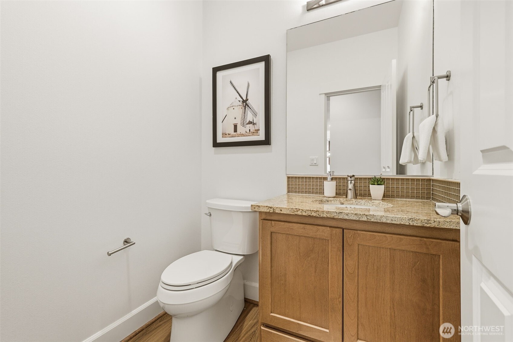 1737 Mt Baker Avenue Northeast Renton, WA 98059 - Photo 18 of 40 a bathroom with a granite countertop toilet sink and mirror