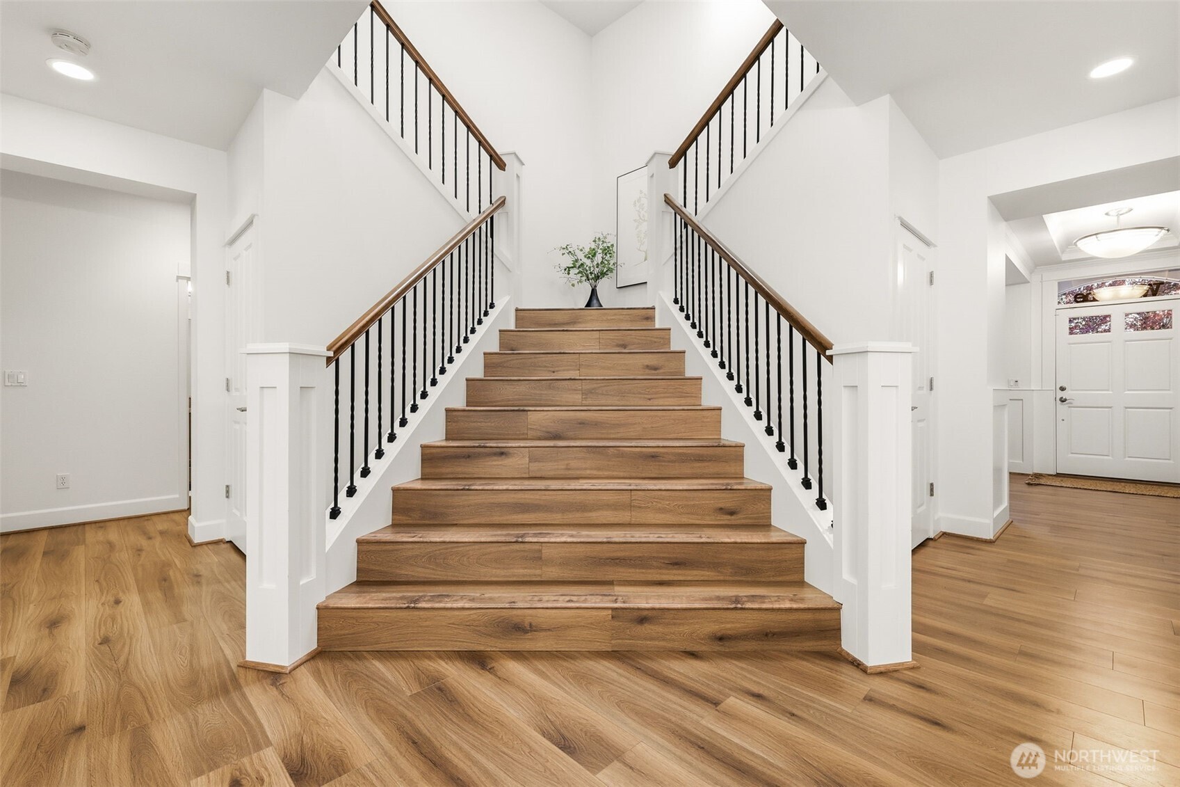 1737 Mt Baker Avenue Northeast Renton, WA 98059 - Photo 19 of 40 a view of entryway and hall with wooden floor