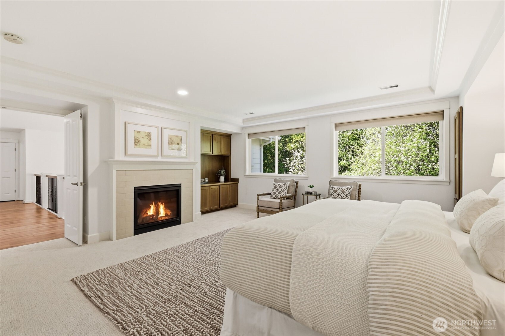 1737 Mt Baker Avenue Northeast Renton, WA 98059 - Photo 20 of 40 a bed room with a bed and a fireplace