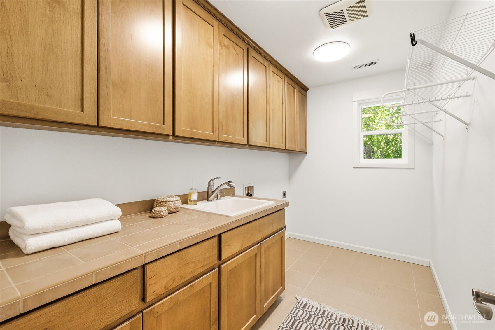 1737 Mt Baker Avenue Northeast Renton, WA 98059 - Photo 28 of 40 a utility room with cabinets