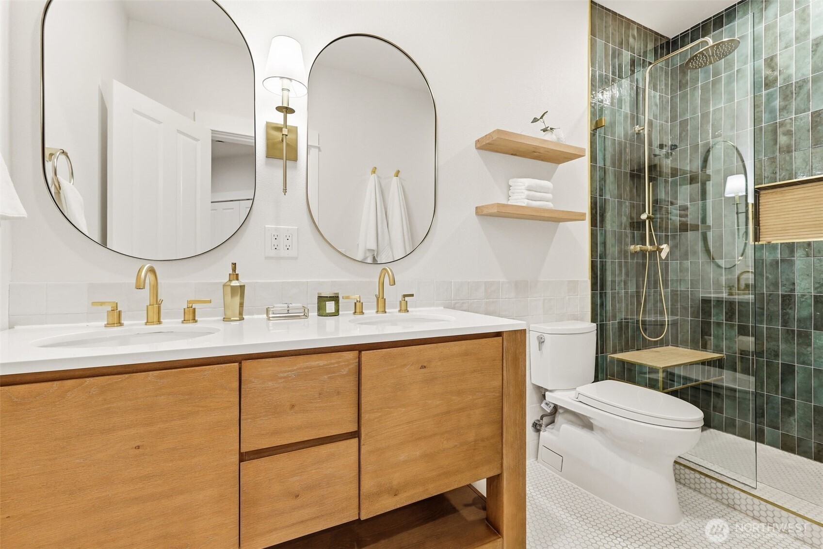 1737 Mt Baker Avenue Northeast Renton, WA 98059 - Photo 35 of 40 a bathroom with a double vanity sink toilet and shower