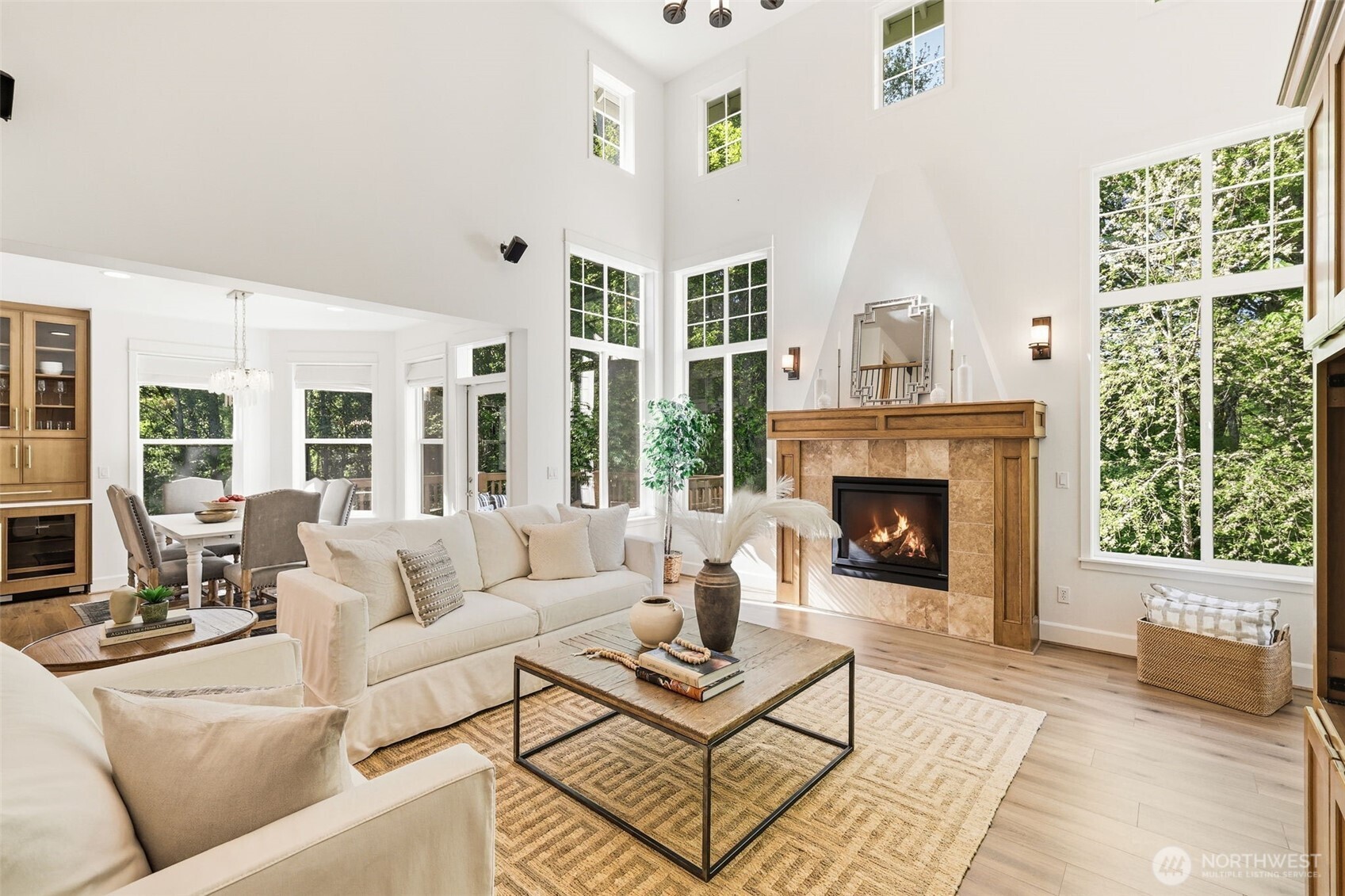 1737 Mt Baker Avenue Northeast Renton, WA 98059 - Photo 5 of 40 a living room with furniture a large window and a fireplace