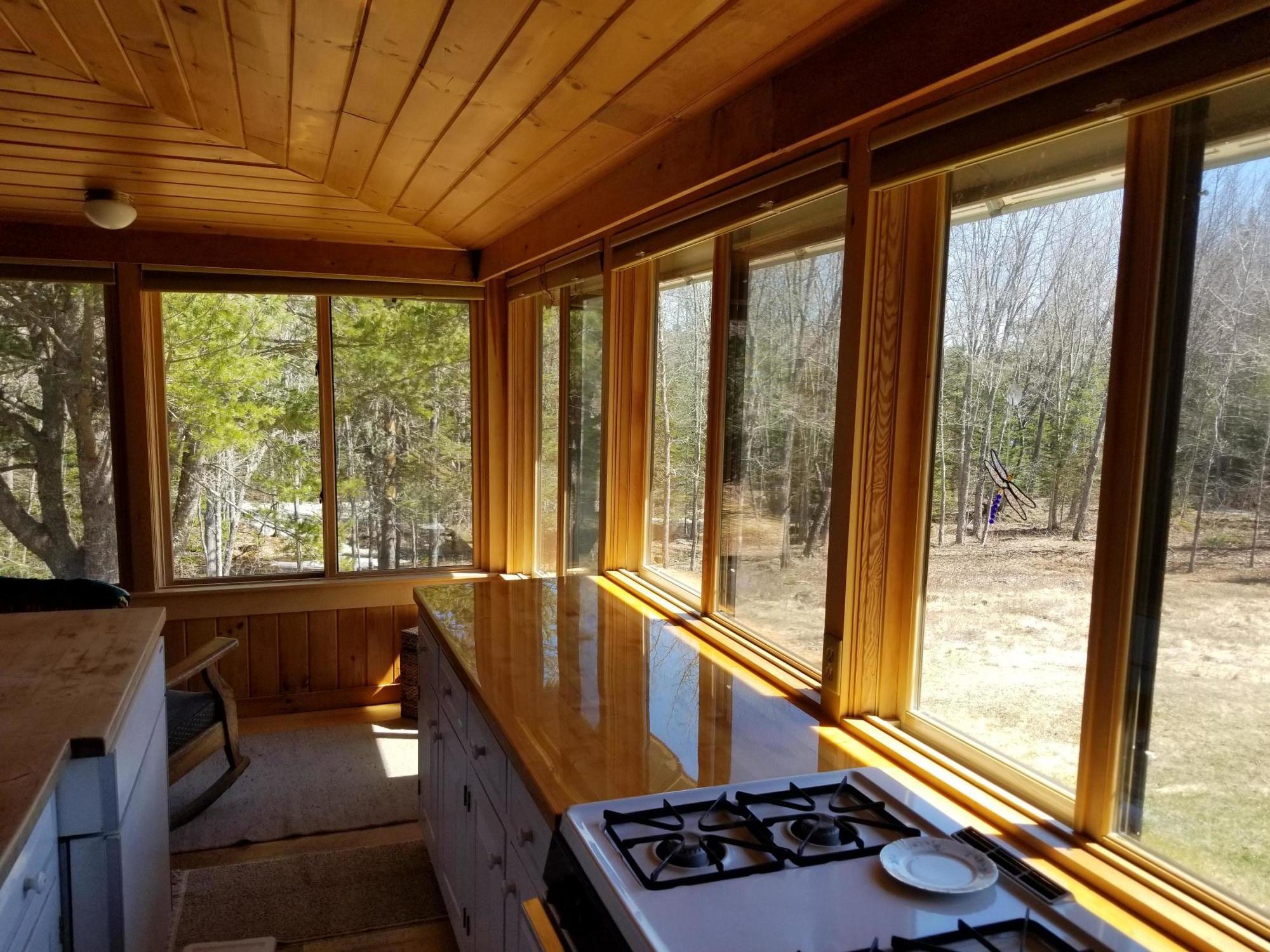 469 Guzzle Road Gouldsboro, ME 04607 - Photo 3 of 22 Kitchen w/eating area toward water.
