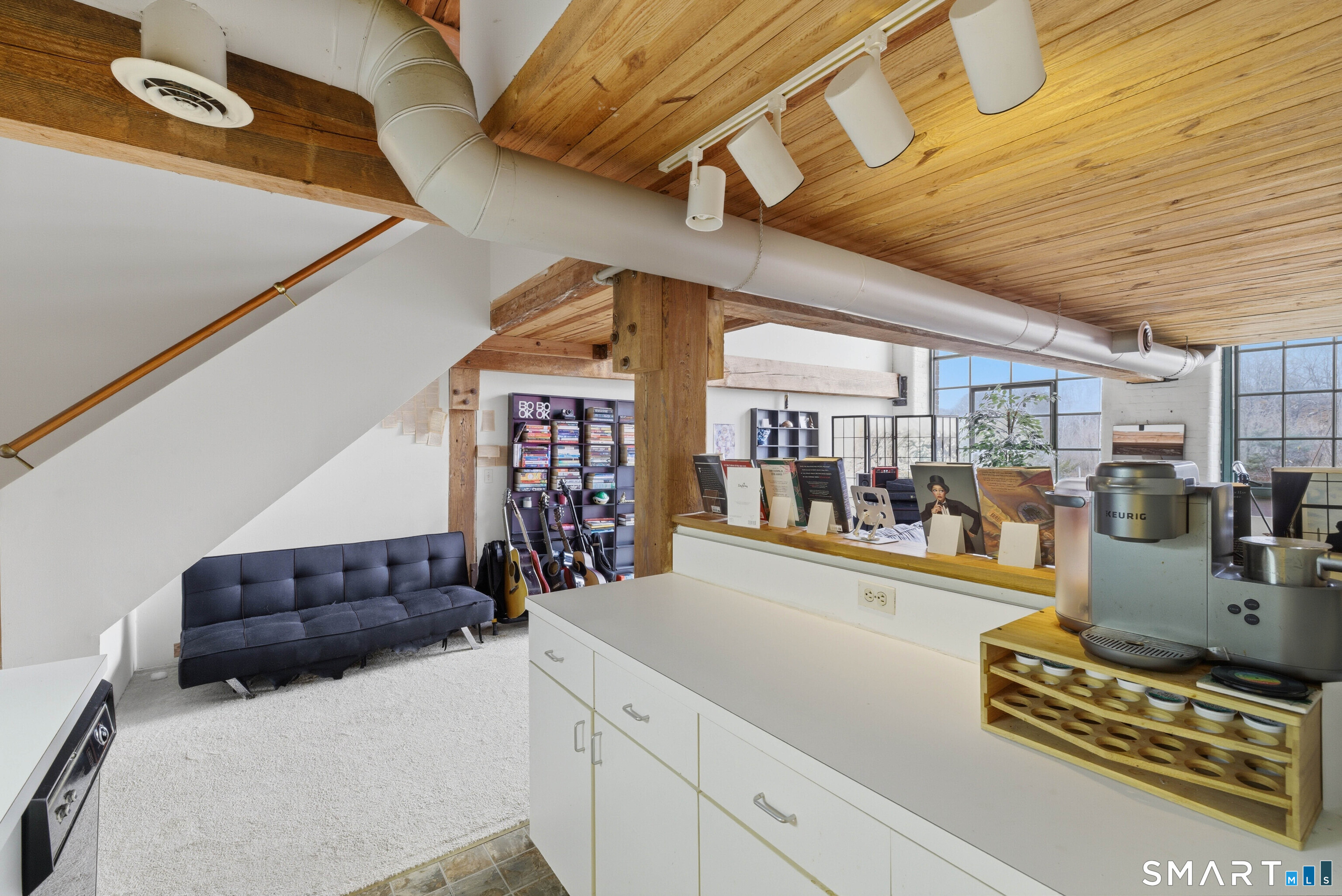 68 Thermos Avenue, Unit 110A Norwich, CT 06360 - Photo 14 of 39 a living room with furniture