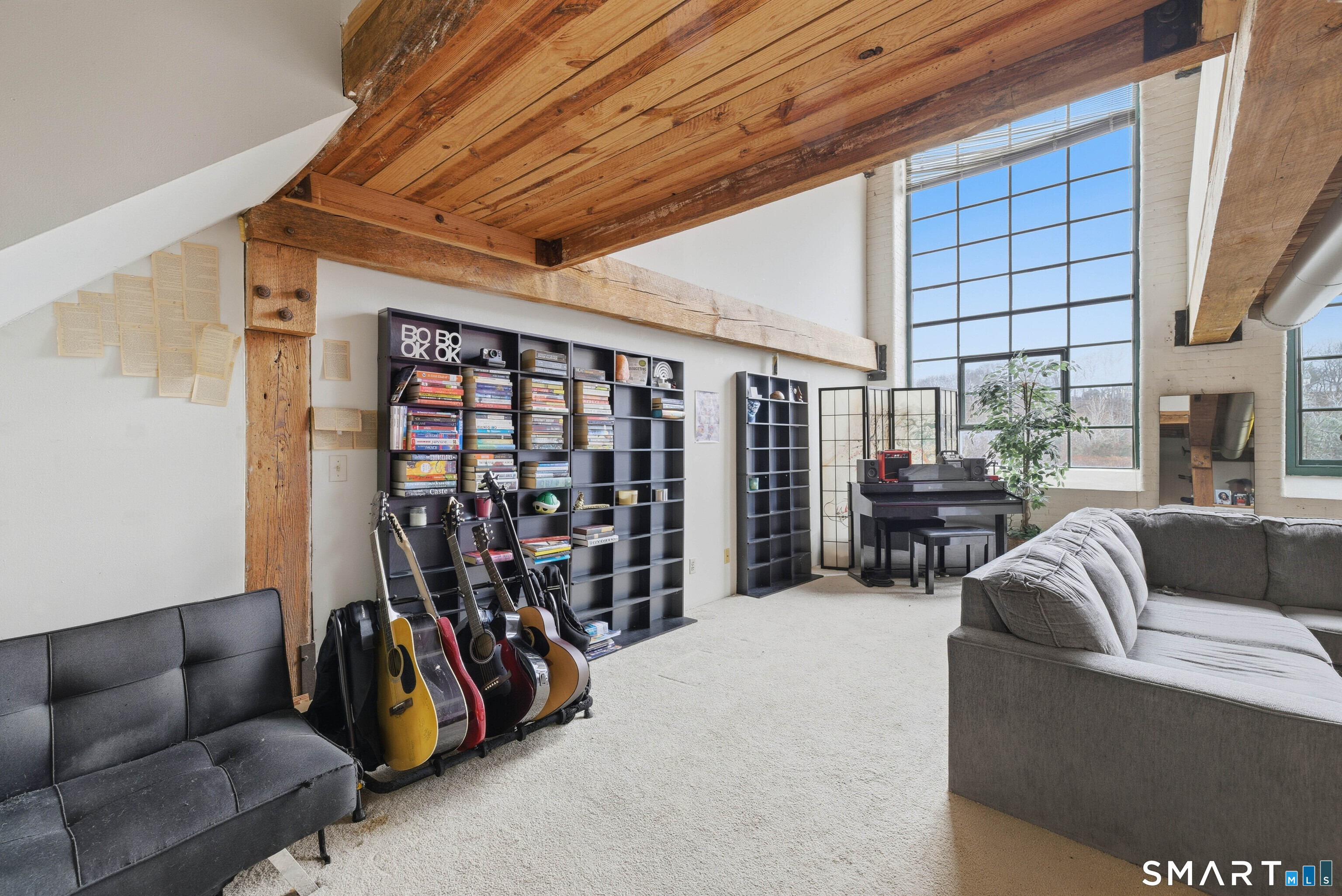 68 Thermos Avenue, Unit 110A Norwich, CT 06360 - Photo 15 of 39 a view of livingroom with furniture and white walls