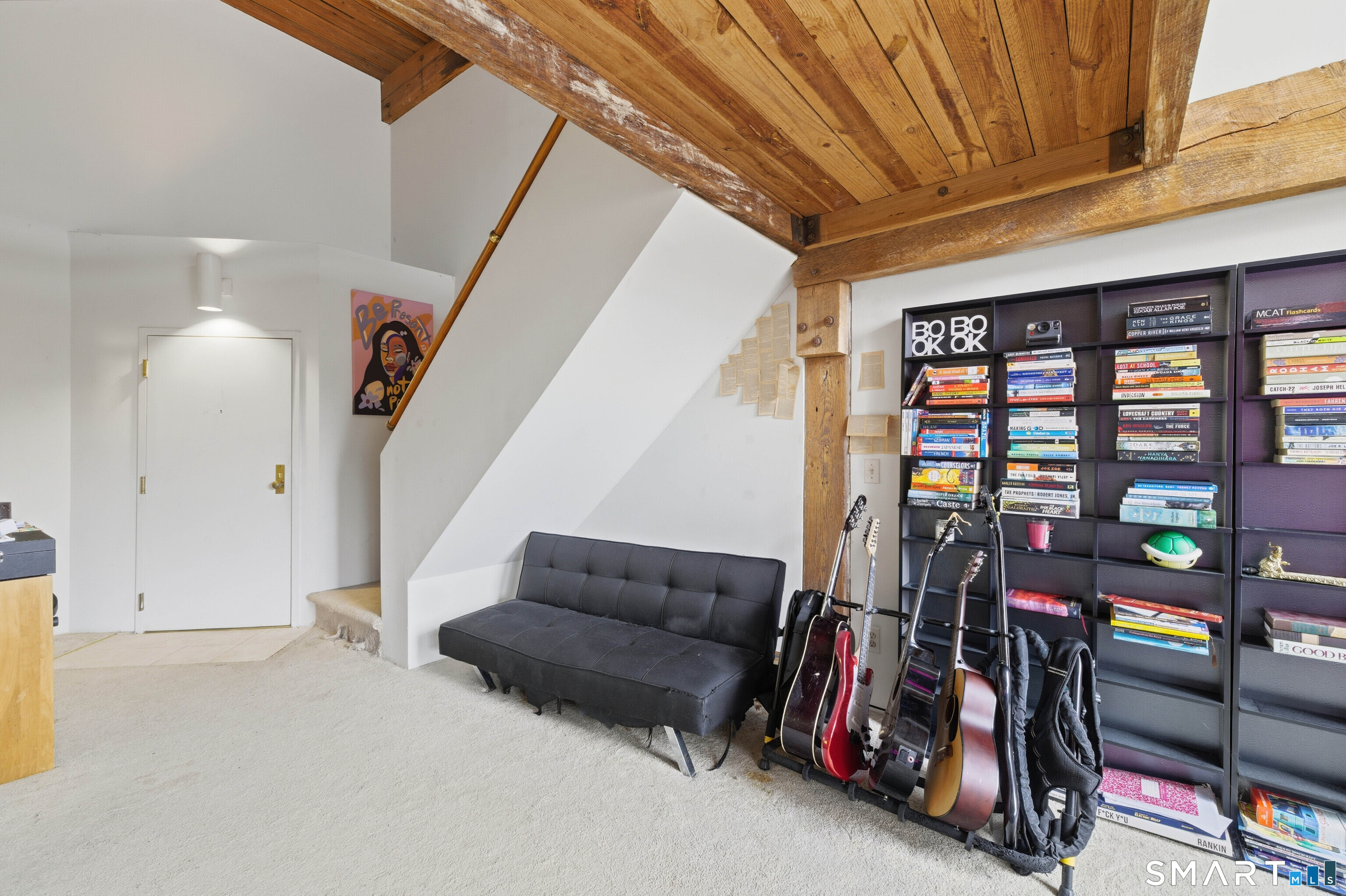 68 Thermos Avenue, Unit 110A Norwich, CT 06360 - Photo 16 of 39 a living room with lots of furniture and white walls