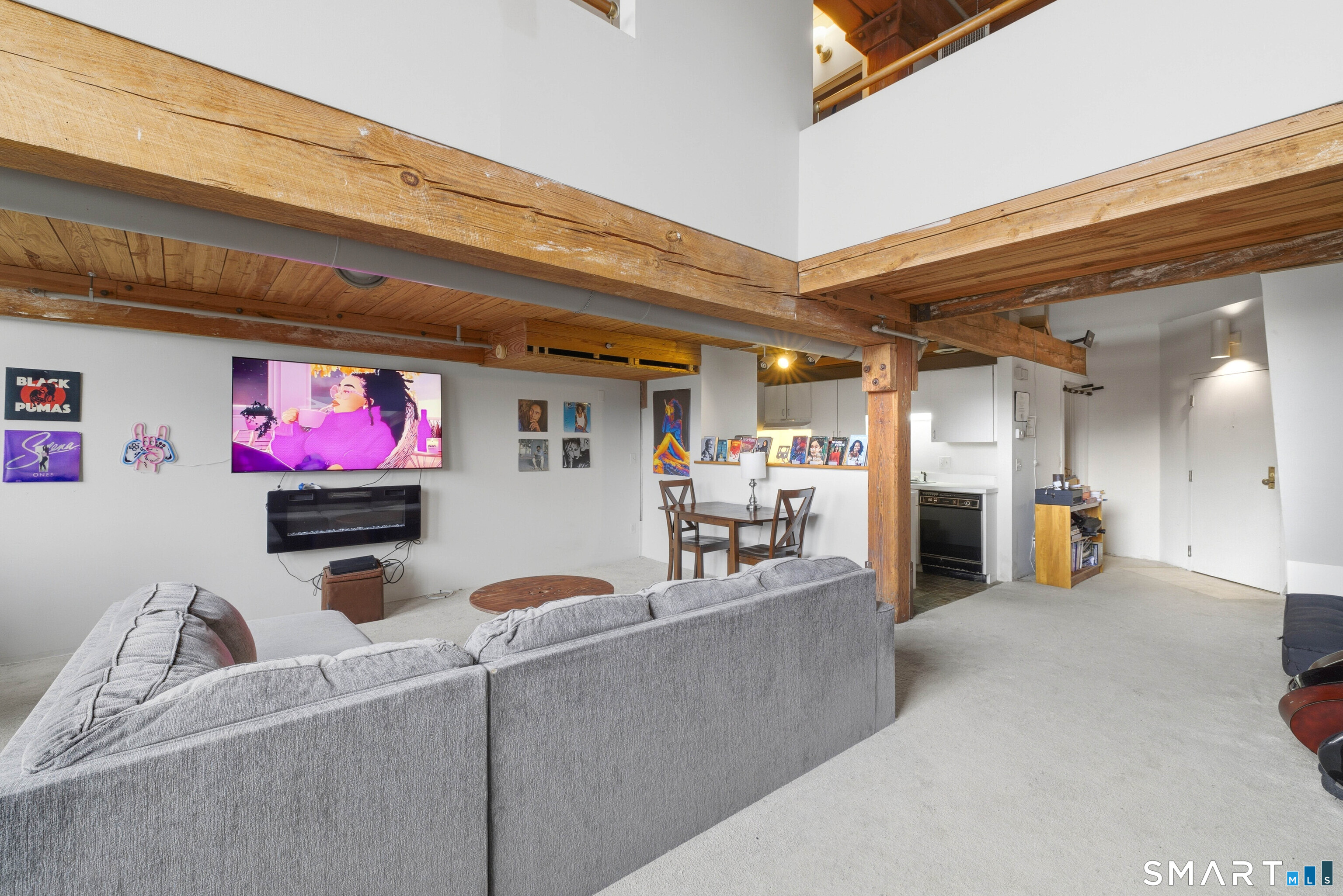 68 Thermos Avenue, Unit 110A Norwich, CT 06360 - Photo 18 of 39 a view of a living room and a flat screen tv