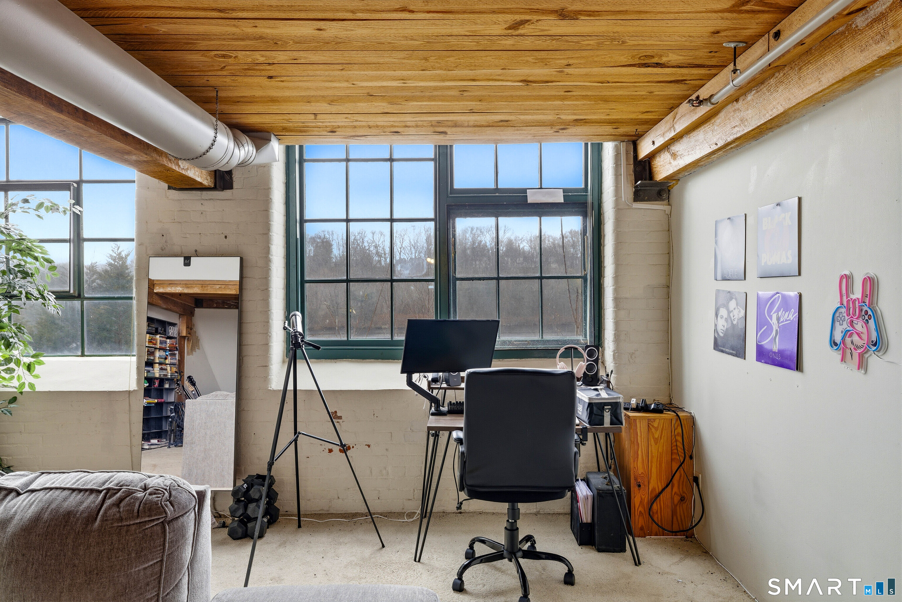 68 Thermos Avenue, Unit 110A Norwich, CT 06360 - Photo 22 of 39 a workspace with furniture and window