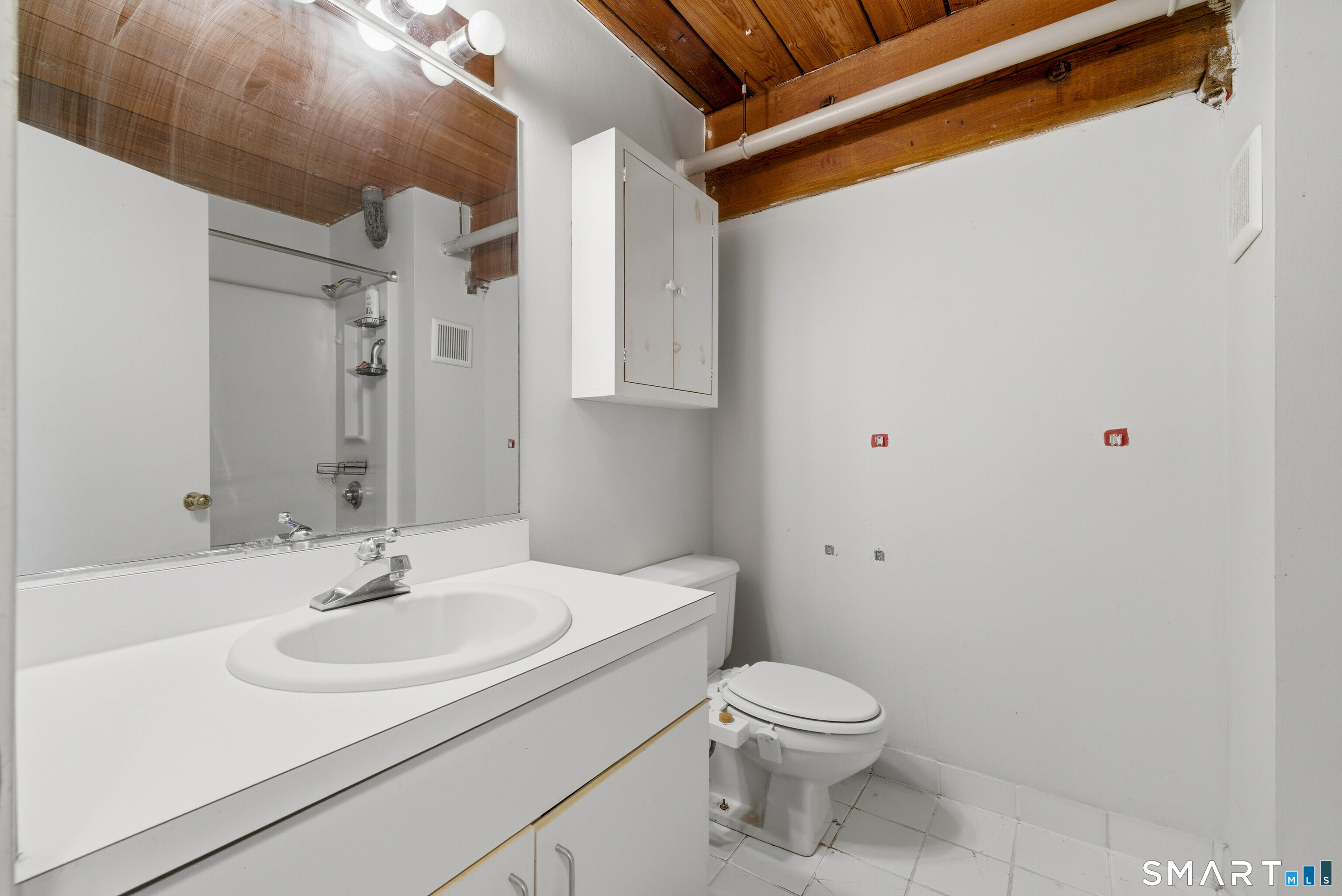 68 Thermos Avenue, Unit 110A Norwich, CT 06360 - Photo 24 of 39 a bathroom with a sink toilet and shower