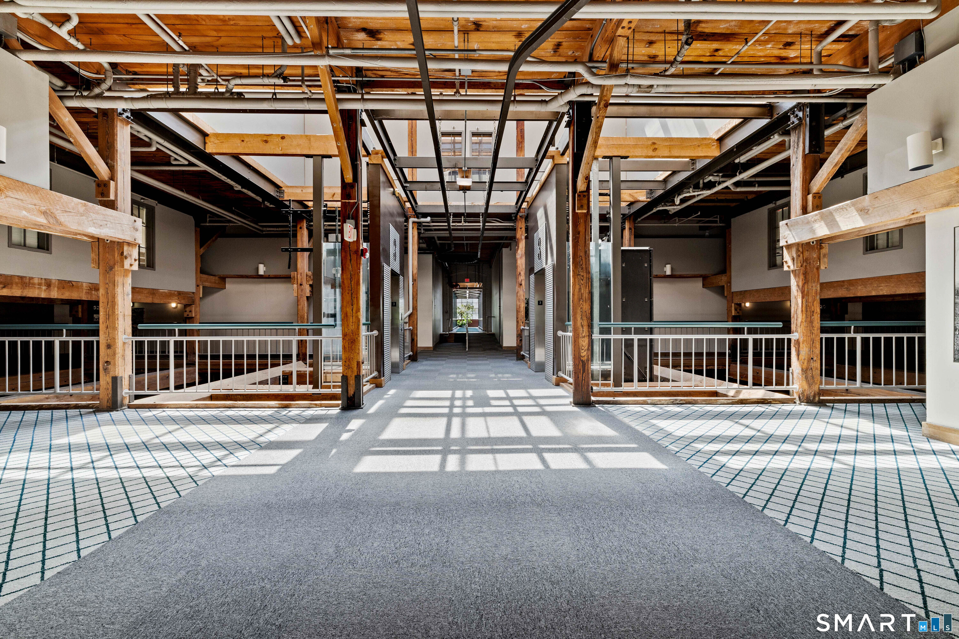 68 Thermos Avenue, Unit 110A Norwich, CT 06360 - Photo 33 of 39 a view of a building with a door and windows