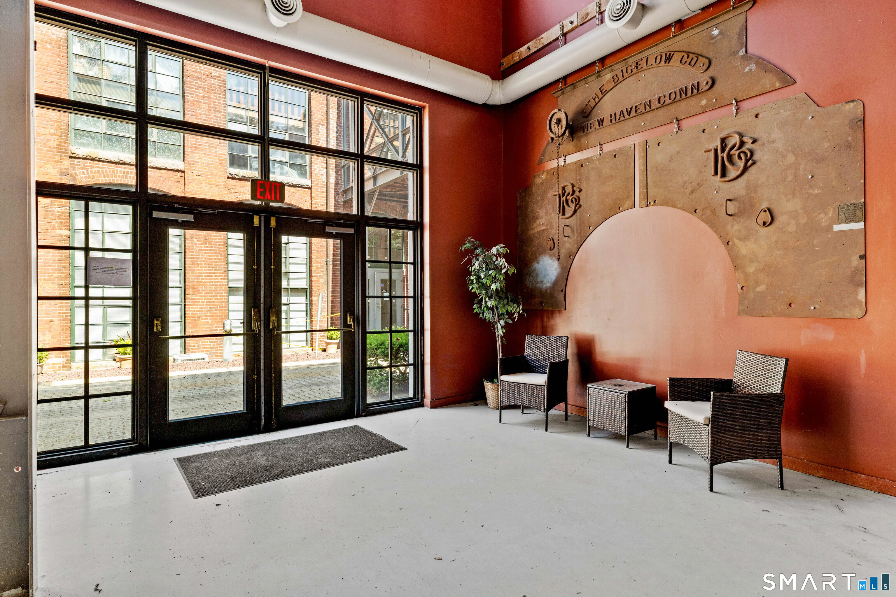 68 Thermos Avenue, Unit 110A Norwich, CT 06360 - Photo 37 of 39 a spacious bedroom with a large bed and a large window