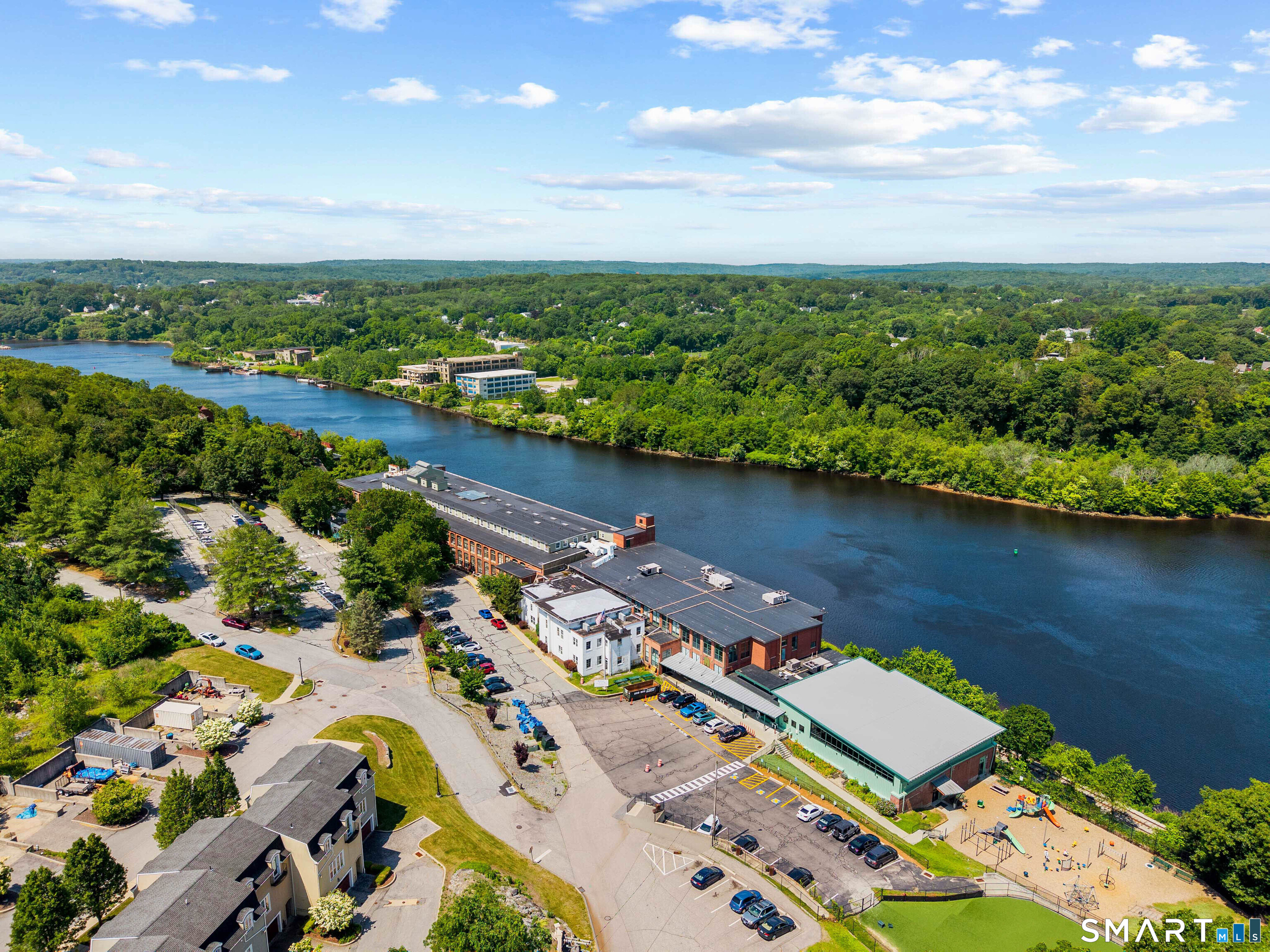 68 Thermos Avenue, Unit 110A Norwich, CT 06360 - Photo 4 of 39 an aerial view of a city with lake view