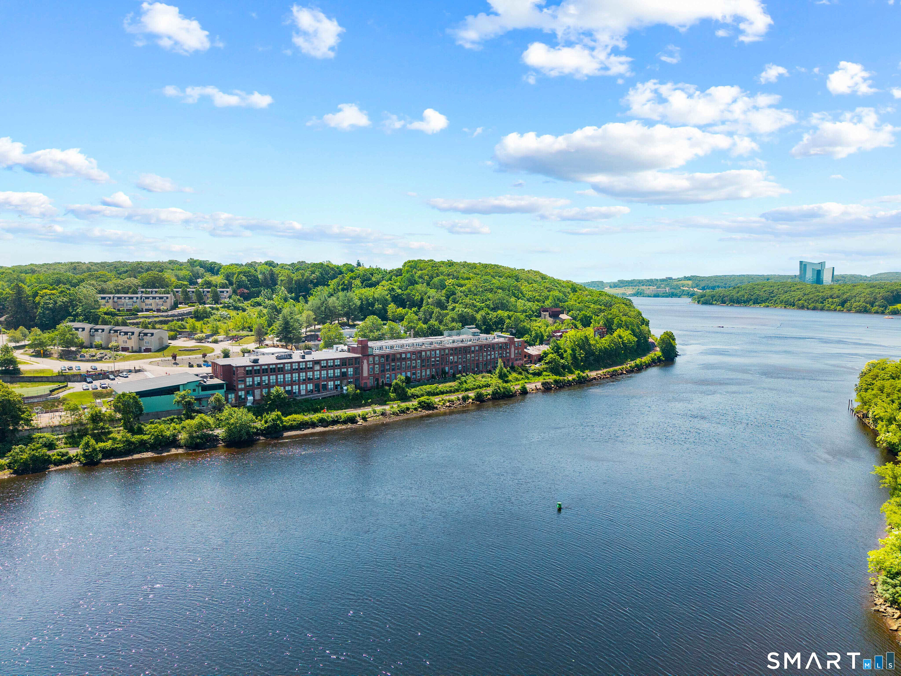 68 Thermos Avenue, Unit 110A Norwich, CT 06360 - Photo 7 of 39 a view of a garden with lawn chairs
