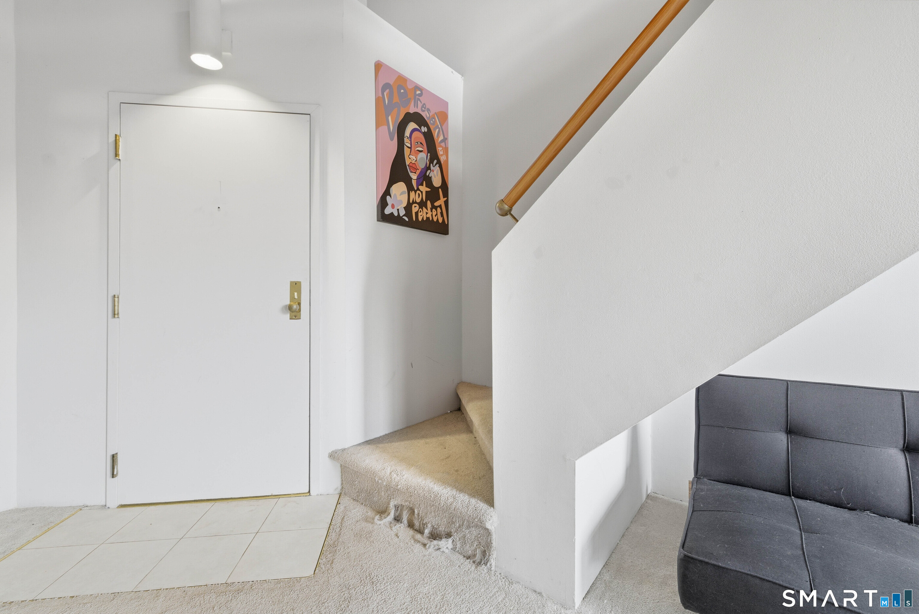 68 Thermos Avenue, Unit 110A Norwich, CT 06360 - Photo 9 of 39 a living room with furniture and a ceiling fan