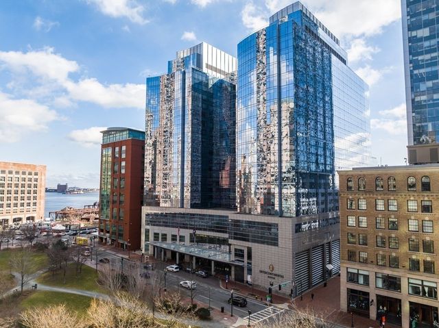 a view of a city with tall buildings