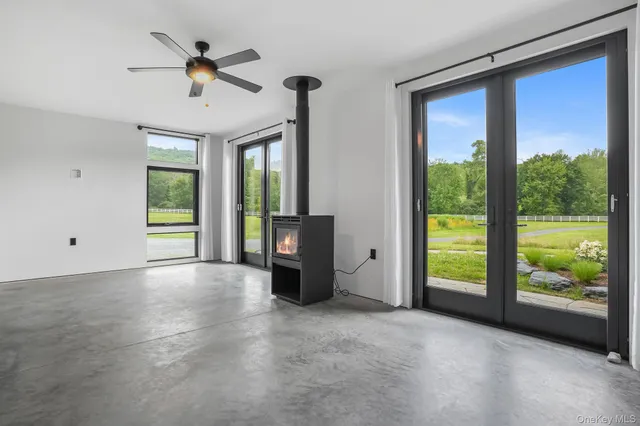 a bathroom with a sink double vanity and a shower