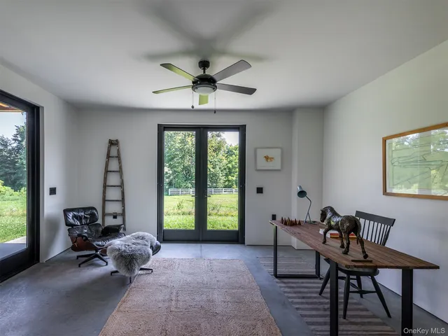 a view of a chair and table in the patio