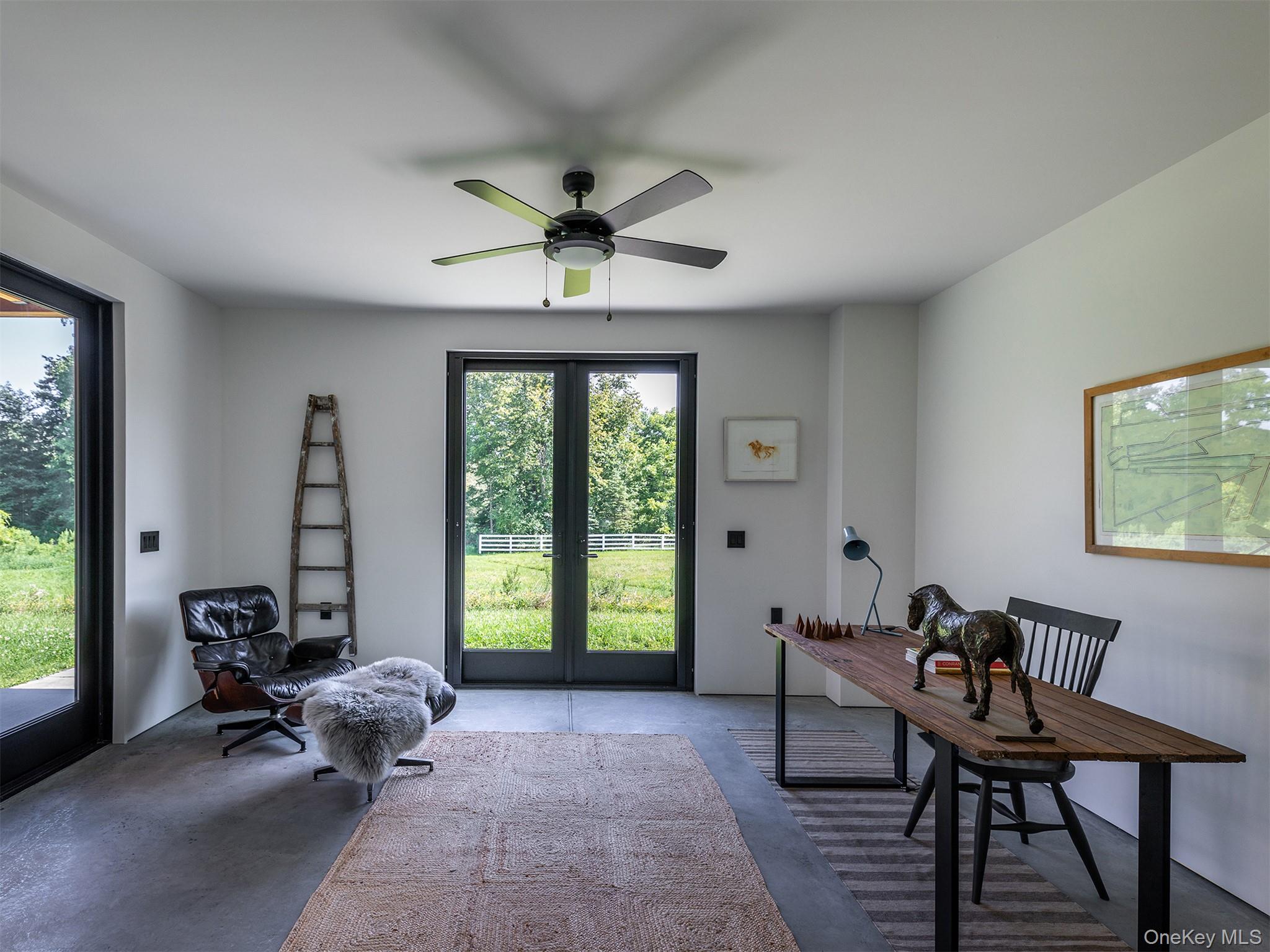 476 Carpenter Hill Road Pine Plains, NY 12567 - Photo 37 of 50 Office area or 3rd bedroom featuring concrete flooring, french doors, and ceiling fan