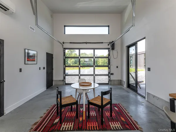 a living room with furniture and a table