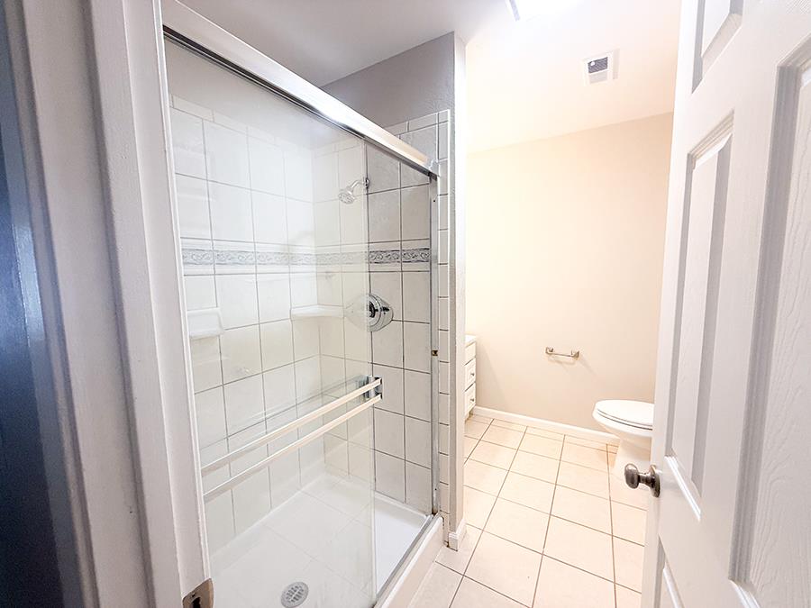 84 Rancho Drive, Unit H San Jose, CA 95111 - Photo 6 of 10 a bathroom with a shower and a toilet