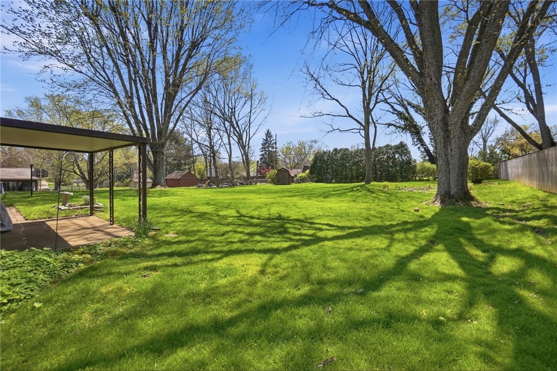 6225 Possum Run Road Bellbrook, OH 45305 - Photo 31 of 33 Expansive green lawn perfect for outdoor living and recreation.