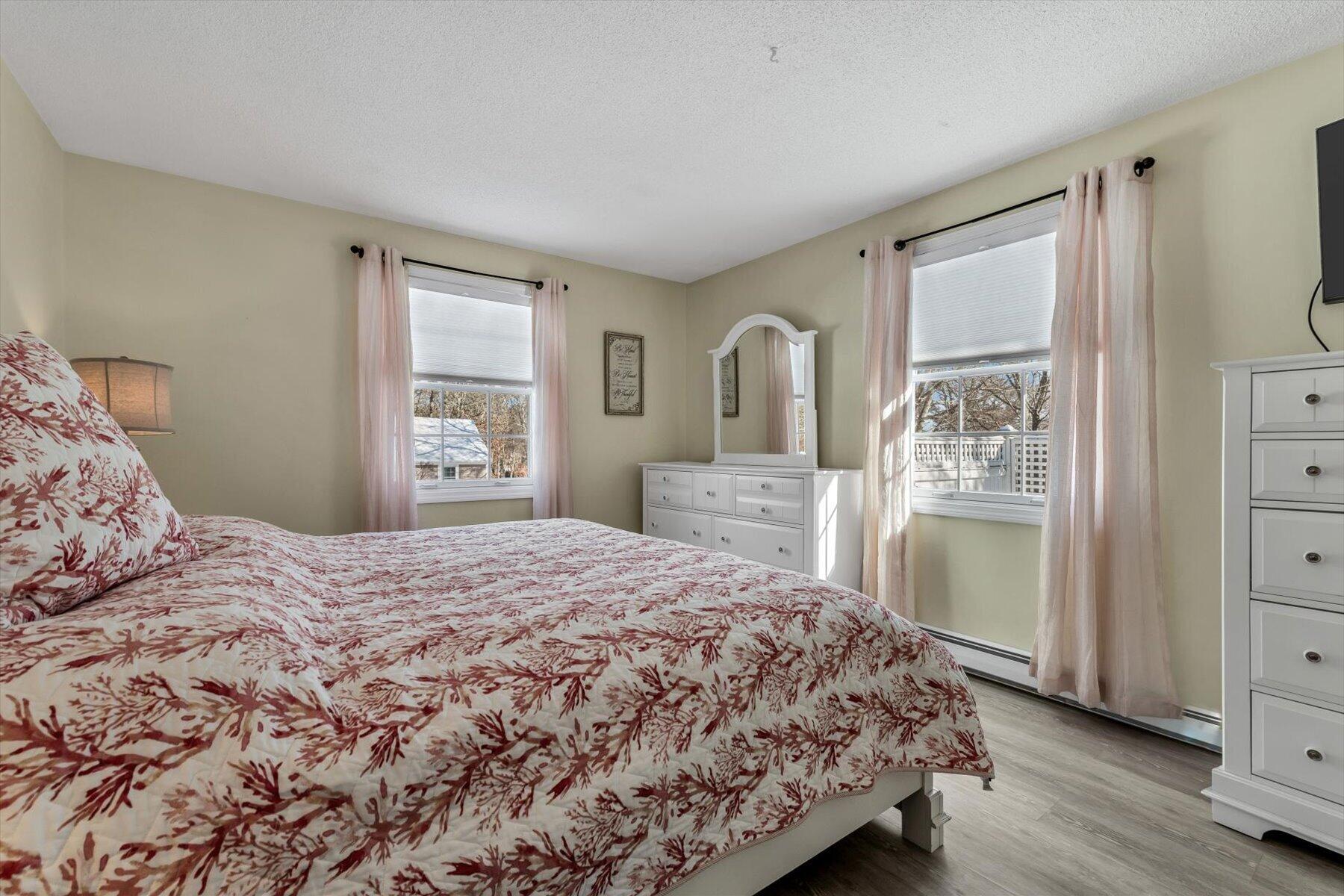 3 McNamara Road West Yarmouth, MA 02673 - Photo 25 of 45 a bedroom with a bed and a dresser