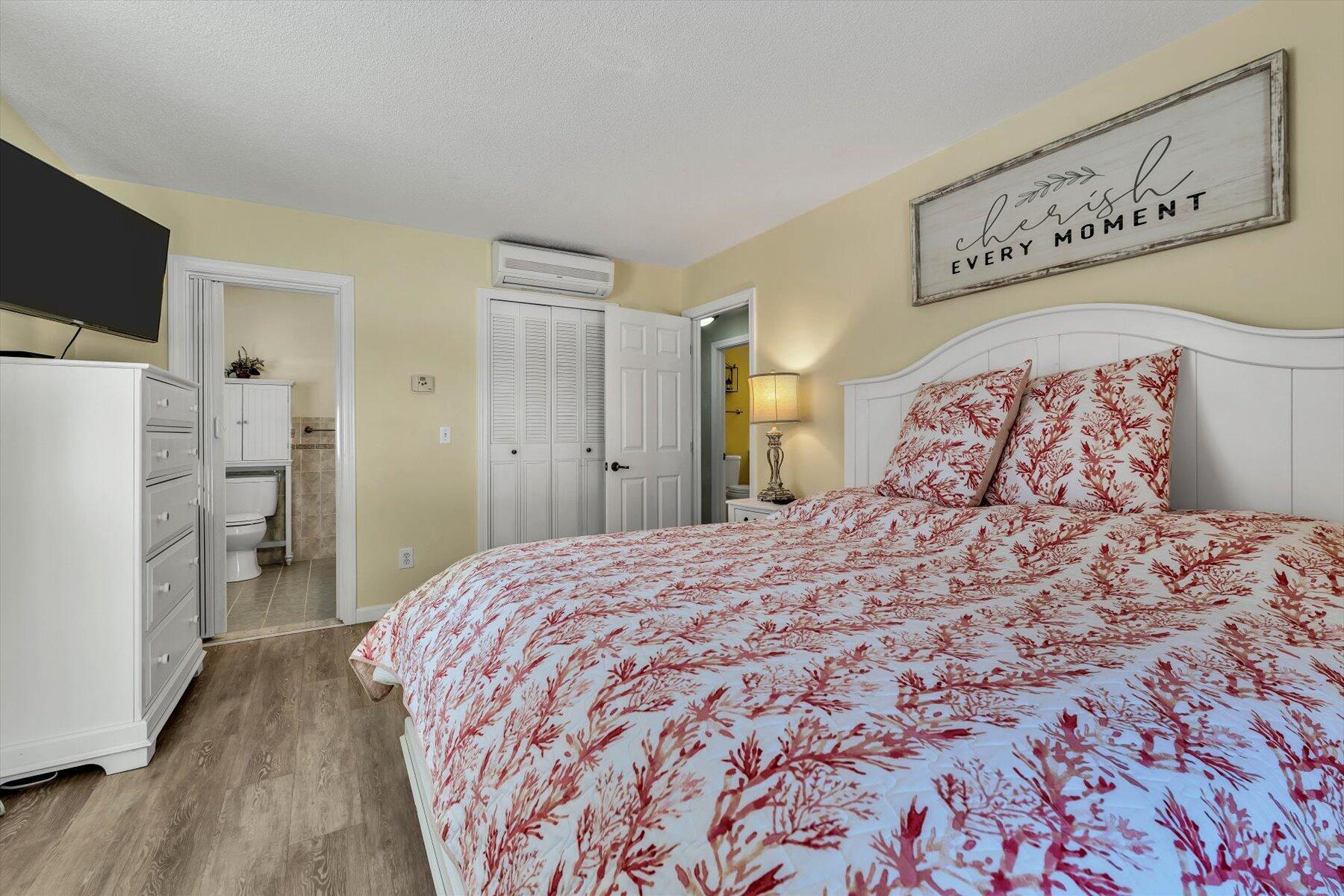 3 McNamara Road West Yarmouth, MA 02673 - Photo 27 of 45 a bedroom with a bed and a flat screen tv