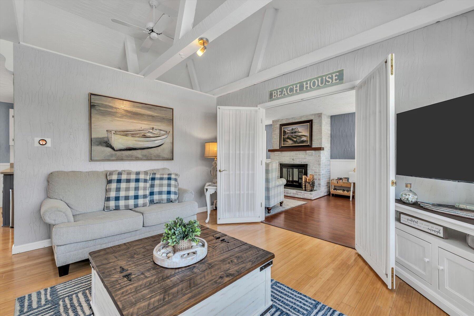 3 McNamara Road West Yarmouth, MA 02673 - Photo 10 of 45 a living room with furniture and a table