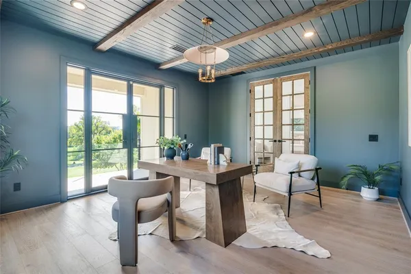 a workspace with furniture window and outside view