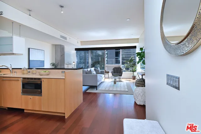 a kitchen with a table and chairs