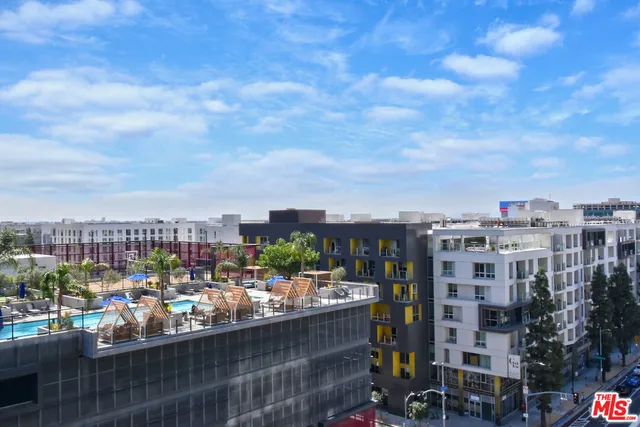 a view of a city with tall buildings