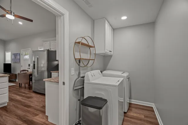 a view of living room washer and dryer