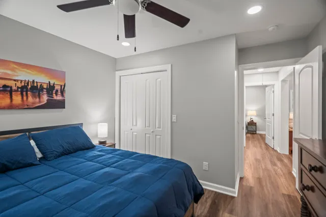 a bedroom with a bed and a view of bedroom